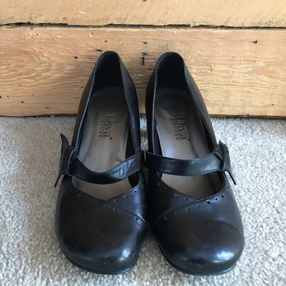 Size nine black one inch heel shoes